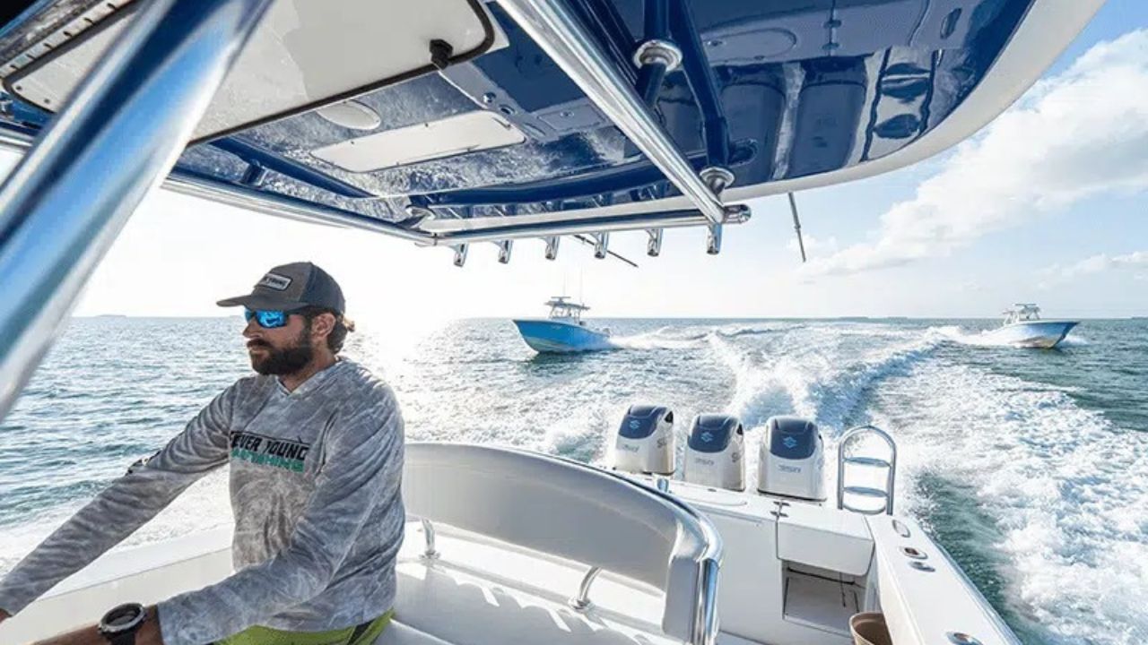 Forever Young charter boat cruising through Florida Keys waters with two boats following behind.